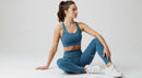 Woman in Blue Activewear Practicing Yoga Pose