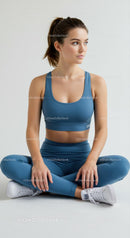Woman Practicing Yoga in Blue Sportswear