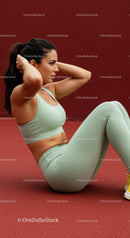 Fit Woman in Active Wear Performing Sit-Ups
