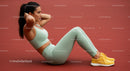 Fit Woman Doing Sit-Ups on Outdoor Track