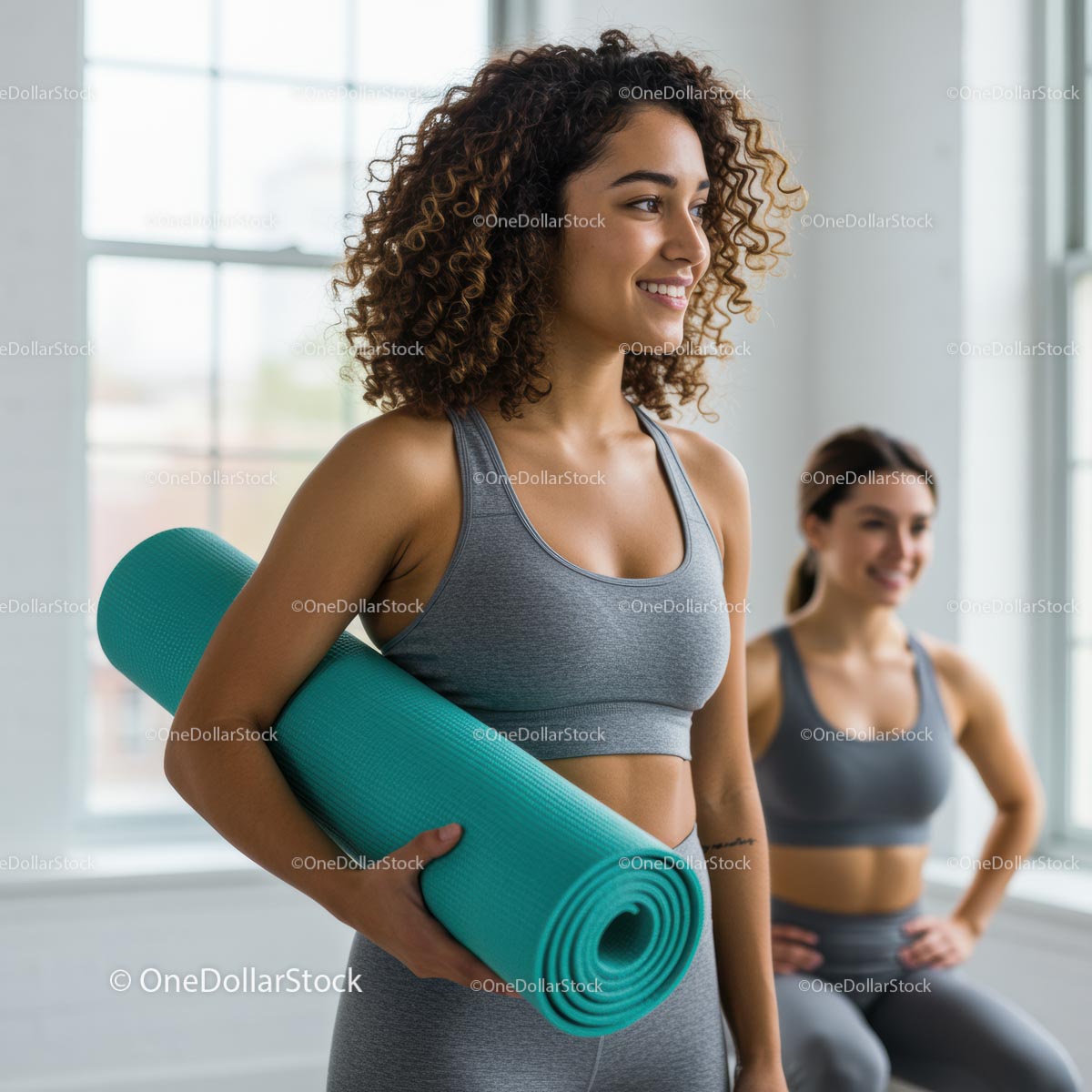Women in Yoga Class Holding Mats and Smiling