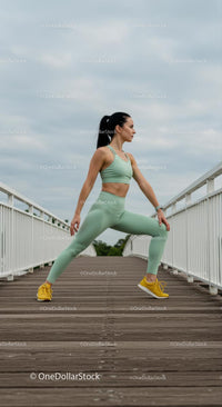 Woman Stretching on Bridge in Mint Green Activewear