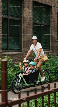 Father and Children Enjoying a Ride on a Cargo Bike