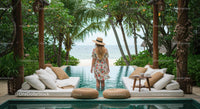 Woman in Floral Dress Enjoying Tropical Infinity Pool