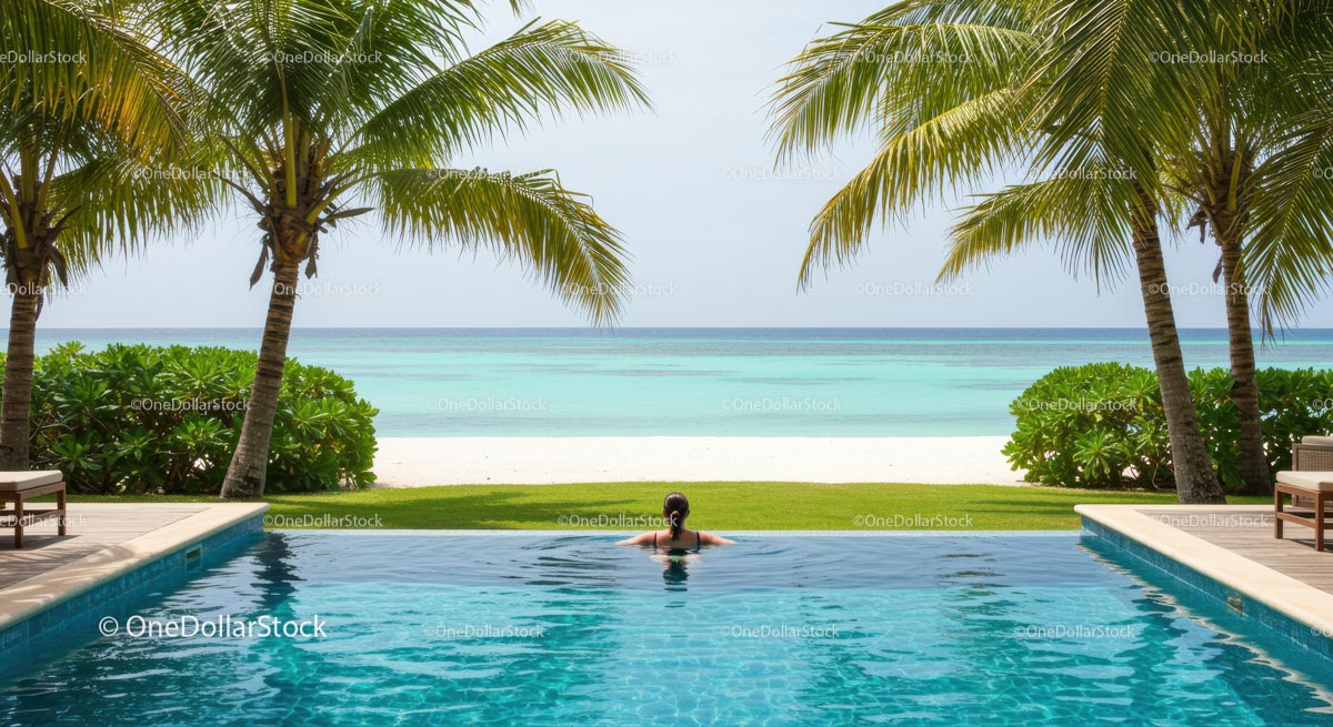 Serene Tropical Infinity Pool with Palm-Shaded Shoreline