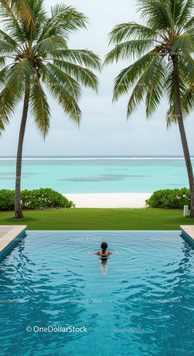 Relaxing in Infinity Pool Overlooking Tropical Beach
