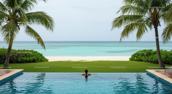 Idyllic Infinity Pool Overlooking Tropical Beach