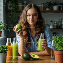 Woman Enjoying Fresh Green Juice in Home Kitchen