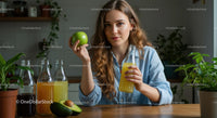 Young Woman Enjoying Fresh Juice in a Modern Kitchen