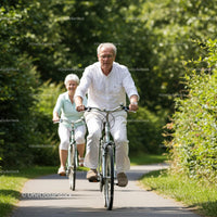 Senior Couple Enjoying a Leisurely Bike Ride in Nature