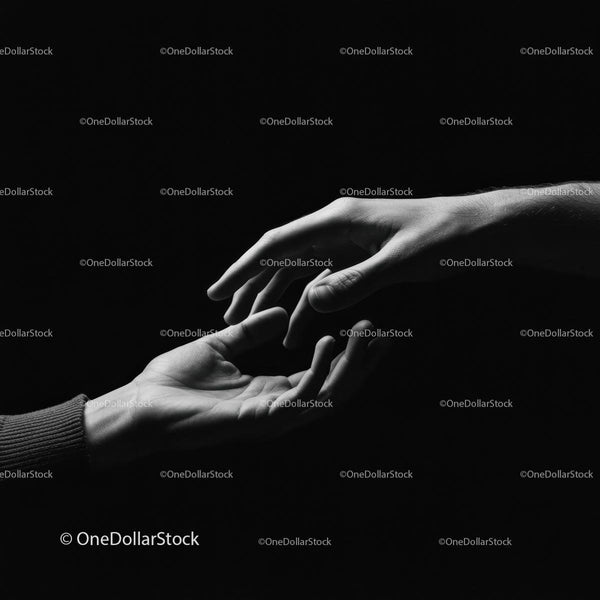 Two Hands Reaching Towards Each Other in Darkness