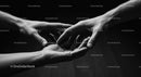Hands Gently Holding Each Other in Black and White