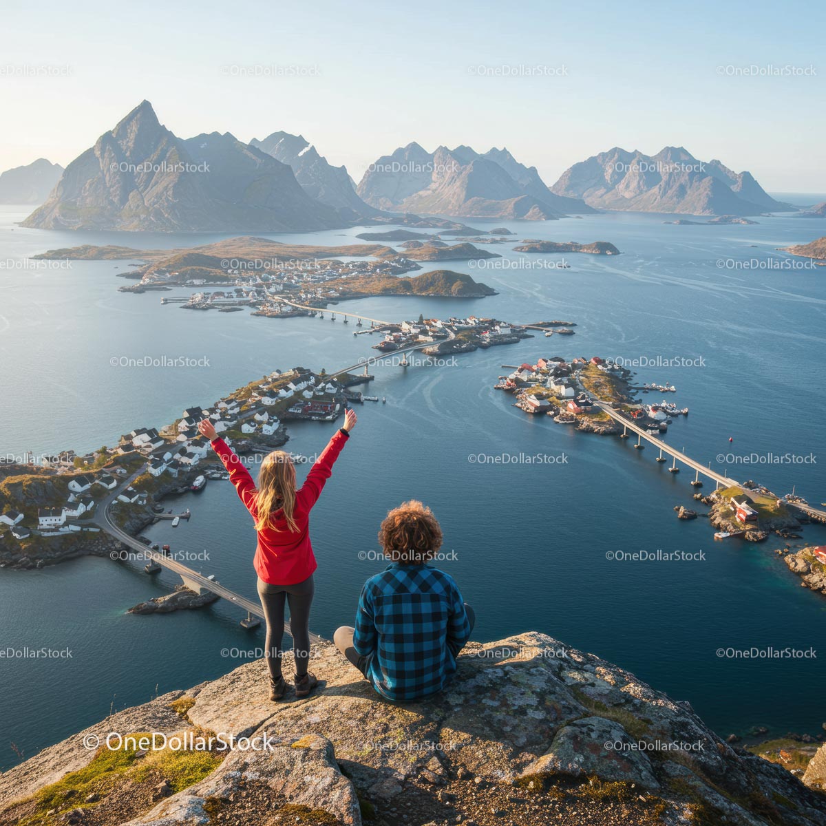 Scenic View of Norwegian Fjord with Hiking Couple