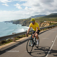 Cyclist Enjoying a Scenic Ride Along the Coast