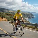 Cyclist on Scenic Coastal Road with Ocean View