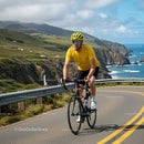 Cyclist on Scenic Coastal Road with Ocean View
