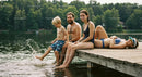 Family Enjoying Summer on a Lakeside Dock