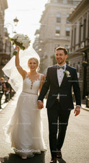 Joyful Bride and Groom Walking in Sunlit City Street