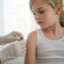 Child Receiving Vaccine at Healthcare Clinic
