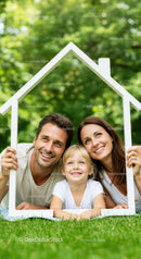 Happy Family Framing New Home in Green Garden