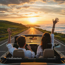 Couple Enjoying a Scenic Sunset Drive in a Convertible