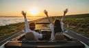 Couple Enjoying a Scenic Convertible Drive at Sunset