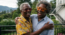 Joyful Embrace of Two Happy Senior Friends Outdoors