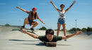 Energetic Friends Enjoying a Skateboarding Adventure