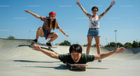 Energetic Friends Enjoying a Skateboarding Adventure