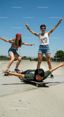 Friends Enjoying Skateboarding in the Park