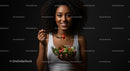 Smiling Woman Enjoying Fresh Salad with Vegetables