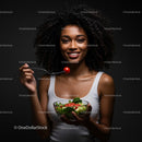 Smiling Woman Enjoying Fresh Salad with Cherry Tomato