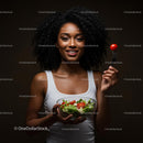 Woman Enjoying a Fresh Salad with Cherry Tomatoes