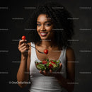 Smiling Woman Enjoying Fresh Green Salad