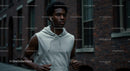 Young Man Jogging in Urban Environment with Earphones