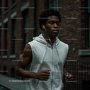 Young Man Jogging in the City with Headphones