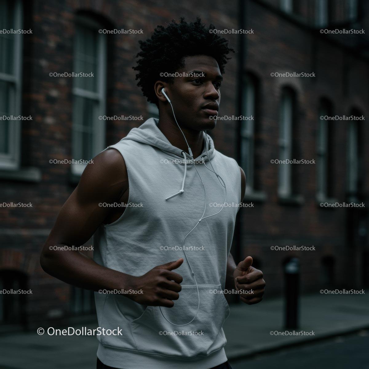Young Man Jogging in the City with Headphones
