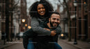 Joyful Couple Enjoying a Playful Moment on City Street