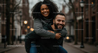 Joyful Couple Enjoying a Playful Moment on City Street