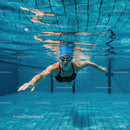 Female Swimmer Freestyle in Clear Pool Water
