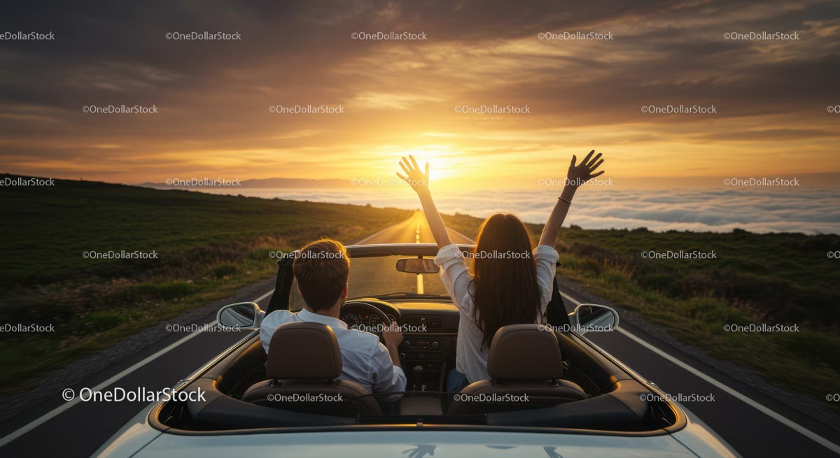 Sunset Drive in Convertible with Raised Hands