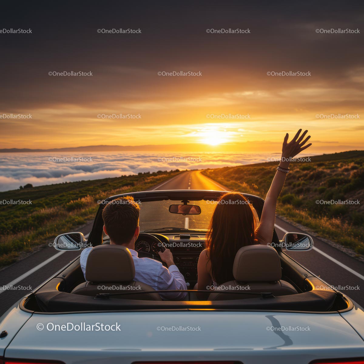 Couple Enjoying Scenic Drive at Sunset in Convertible