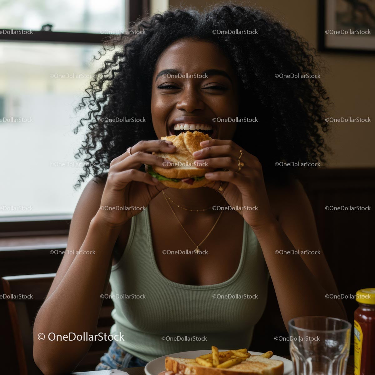 Joyful Woman Savoring a Delicious Burger Indoors