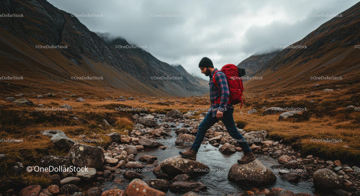 Hiker Trekking Through Majestic Mountain Valley