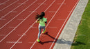 Female Athlete Jogging on Red Running Track