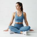 Woman in Blue Sportswear Practicing Yoga