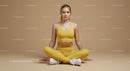 Young Woman Meditating in Yellow Fitness Outfit