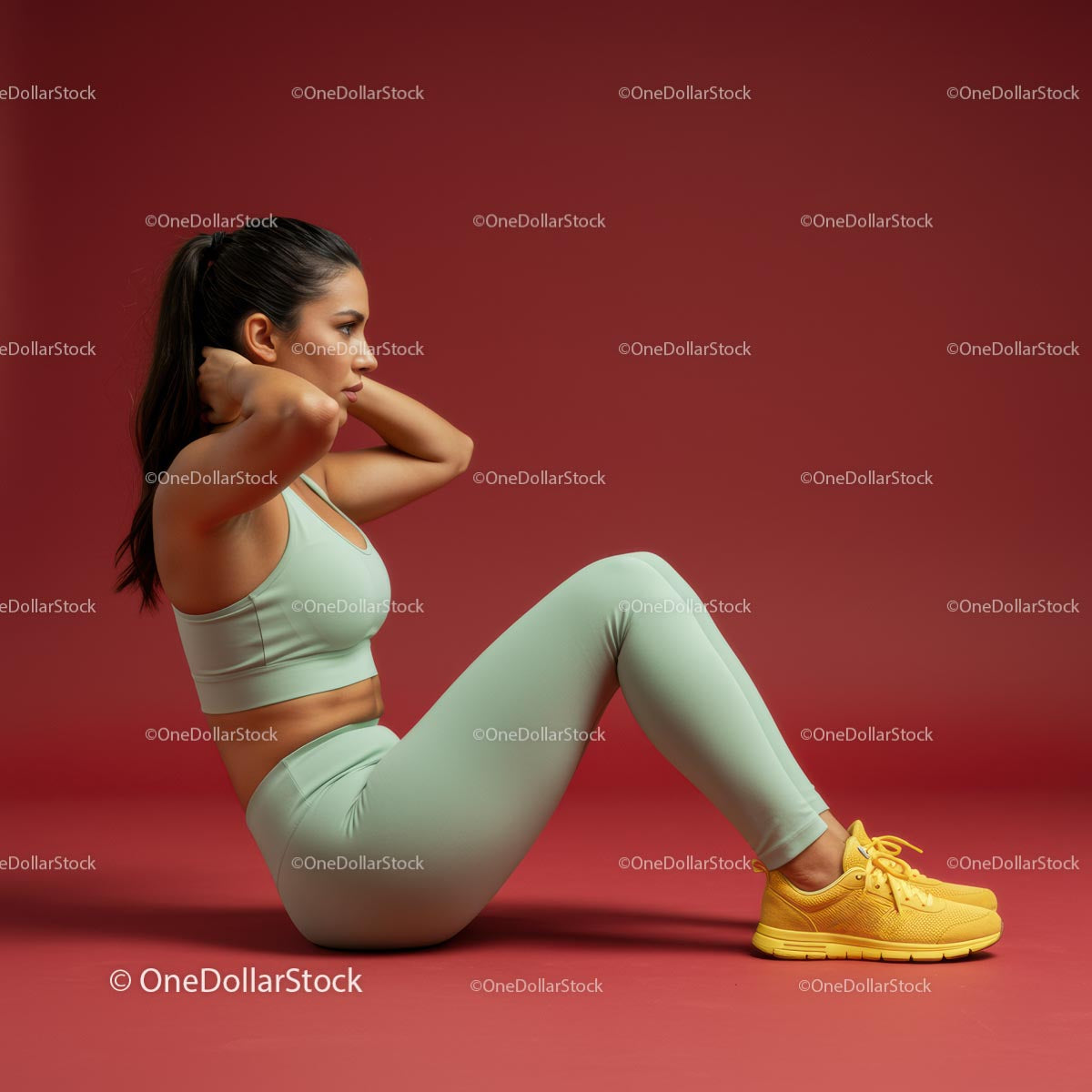 Fit Woman Performing Sit-Ups in Athletic Gear