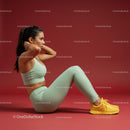 Fit Woman Performing Sit-Ups in Athletic Gear