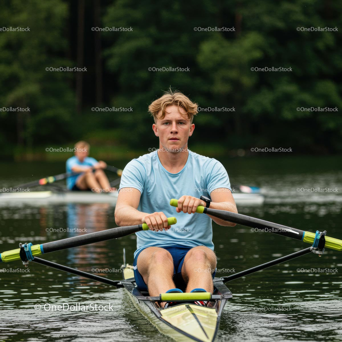 Focused Male Rower on Tranquil Lake